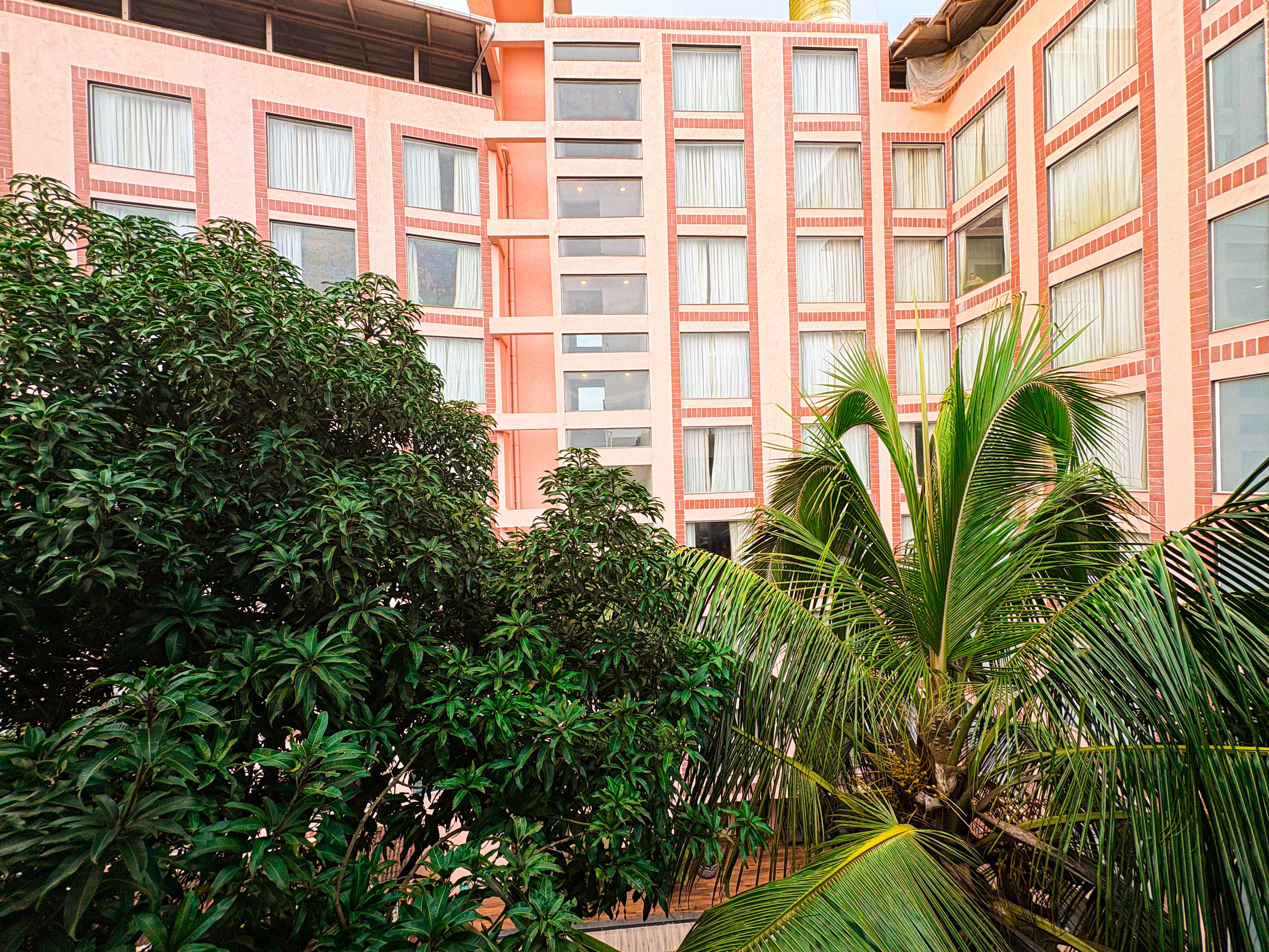 A serene view of the sparkling clean pool at Q 23 Resort